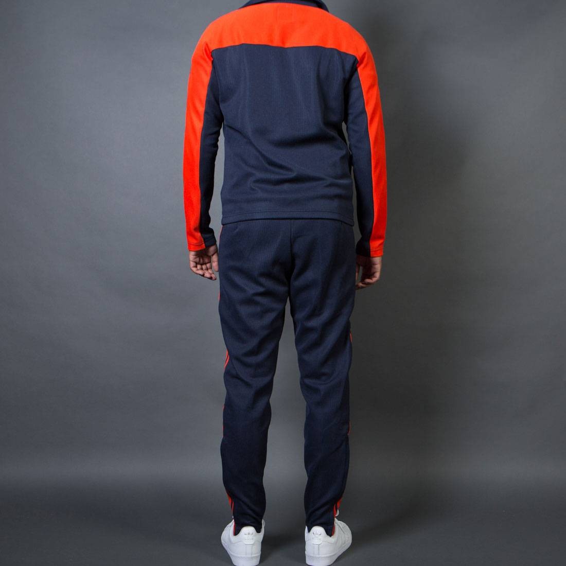 grey and orange adidas pants
