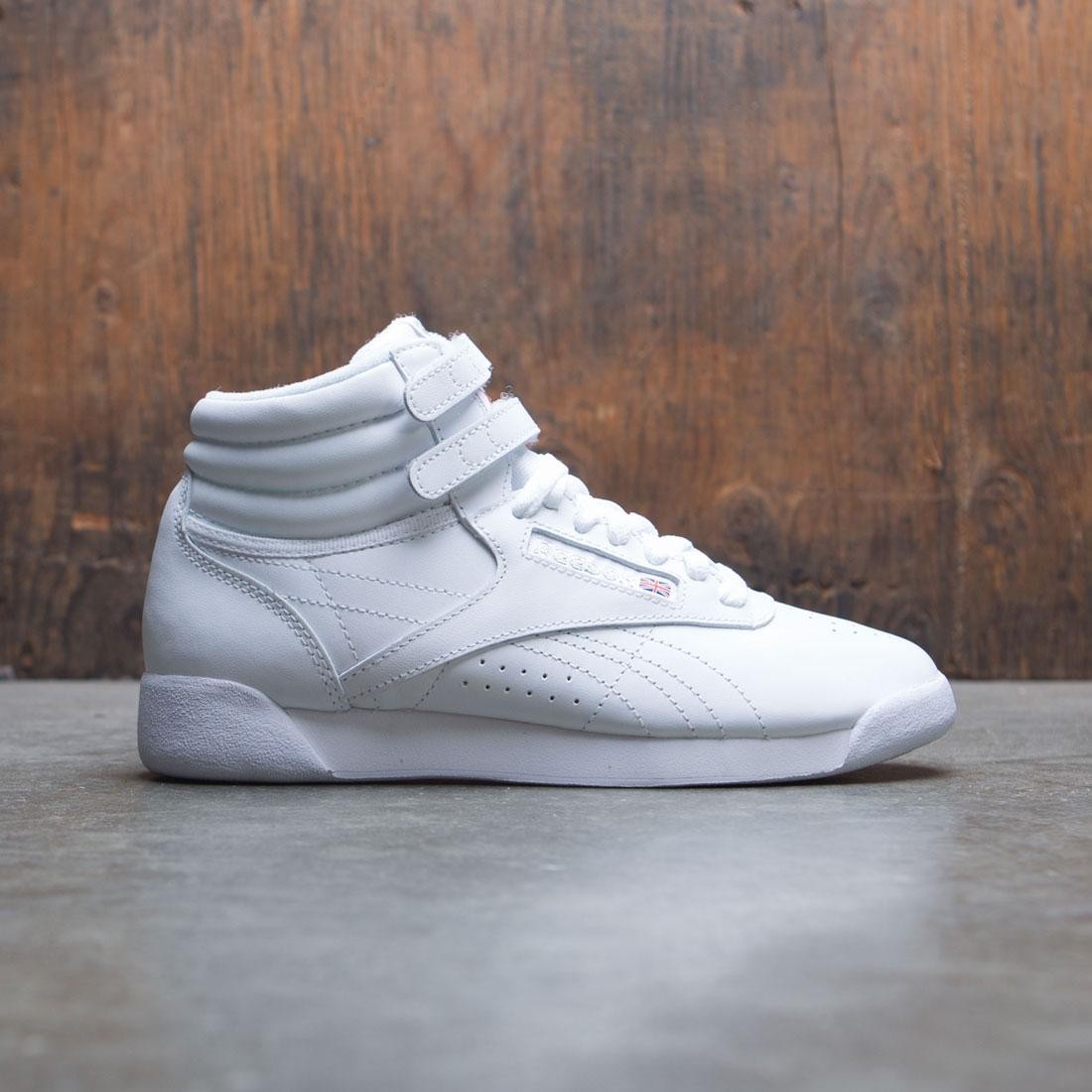 white and silver reebok