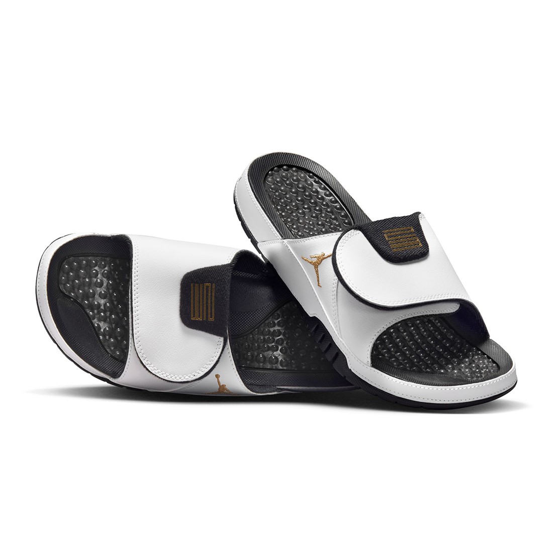 White and gold jordan top slides