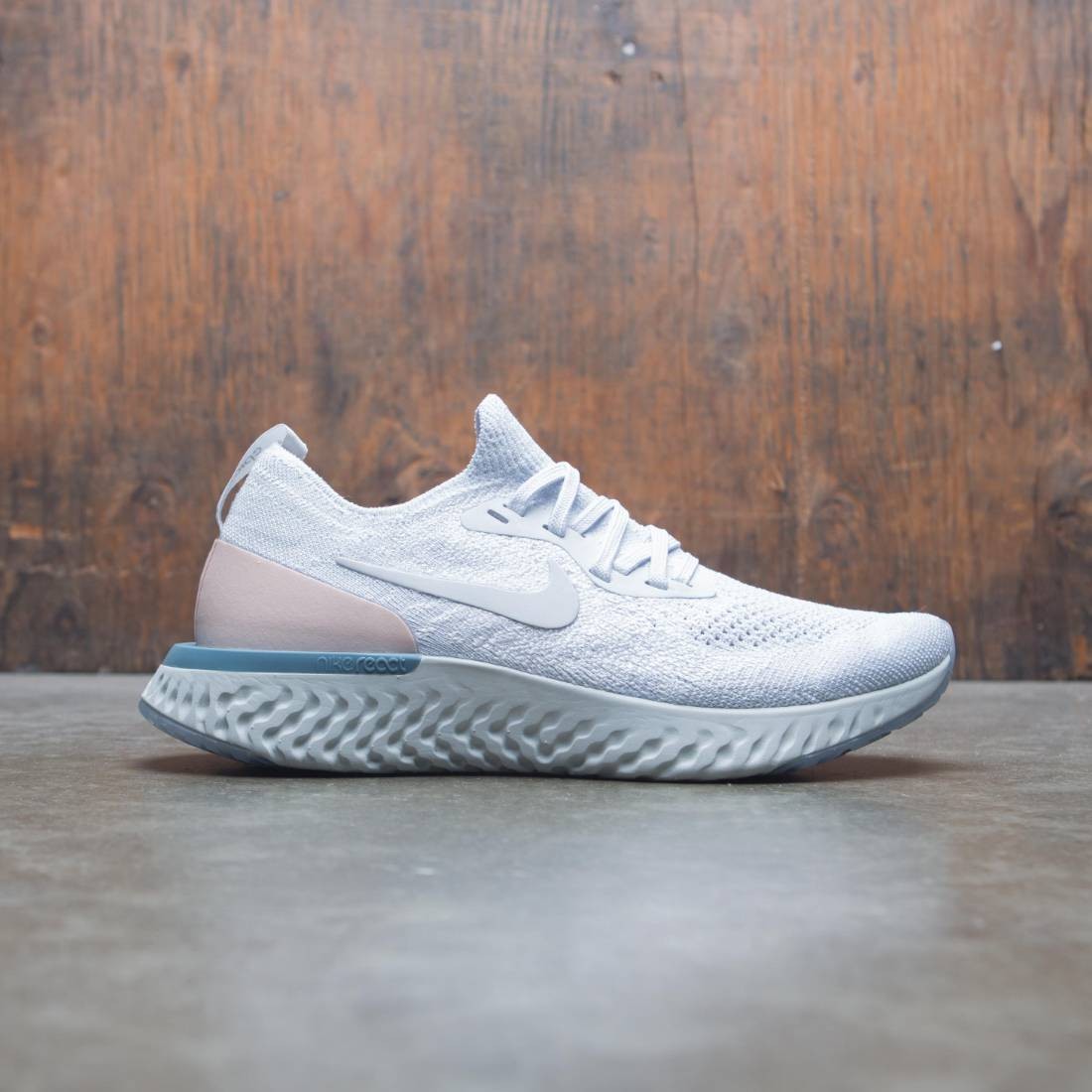 Running Women Nike Epic React Flyknit Sports Shoes at best price in Surat
