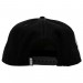 Black hat with an embroidered pattern and silver-tone logo appliqué from